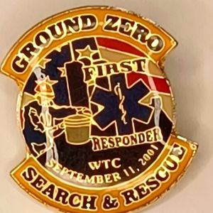Three original Ground Zero pins